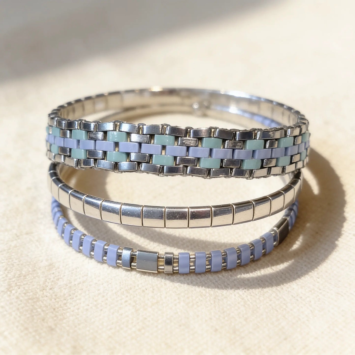 Handmade Azure Flow Miyuki Tila bracelet by Gem N Glow, featuring intricate beadwork with vibrant blue beads.