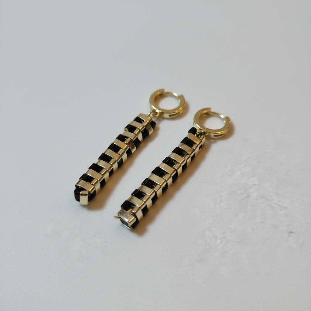 Handmade black and gold Miyuki bead drop earrings with geometric minimalist design